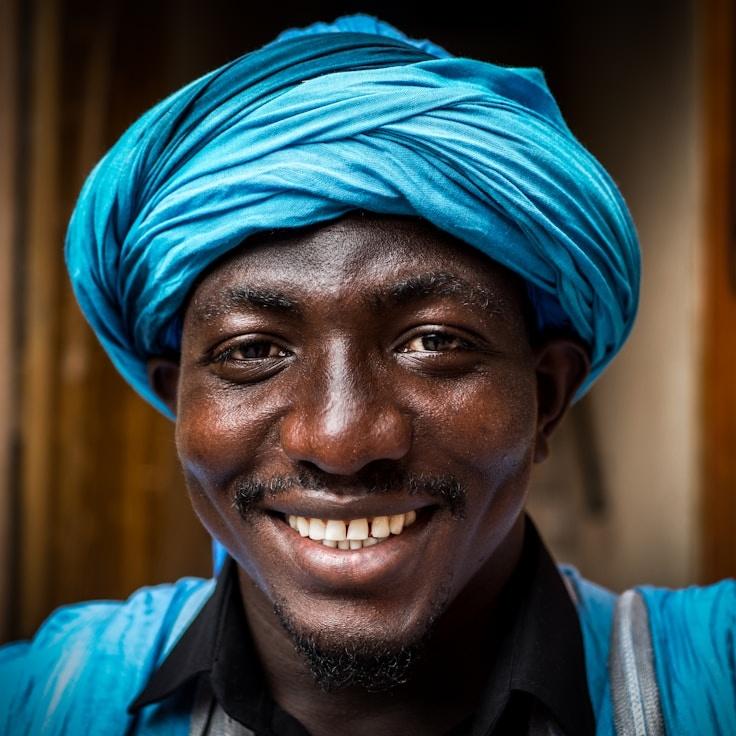 Avery Cole, Lead Design Curator at Echo Harbor Field, reviewing corporate floral arrangements